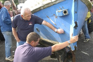 w053407d pic DJ One of Whitby's rowing lifeboats returns to it's home port, Lifeboats crew check the condition of the boat